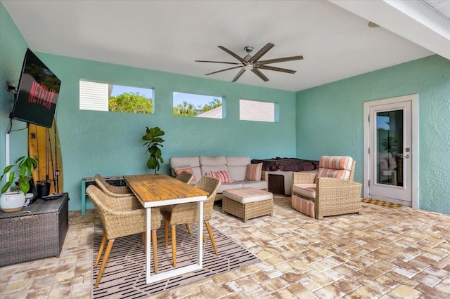 view of patio / terrace with an outdoor living space and ceiling fan