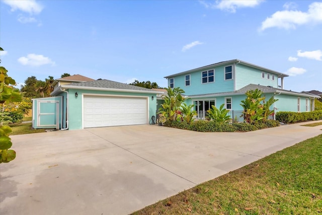 view of front of home with a garage