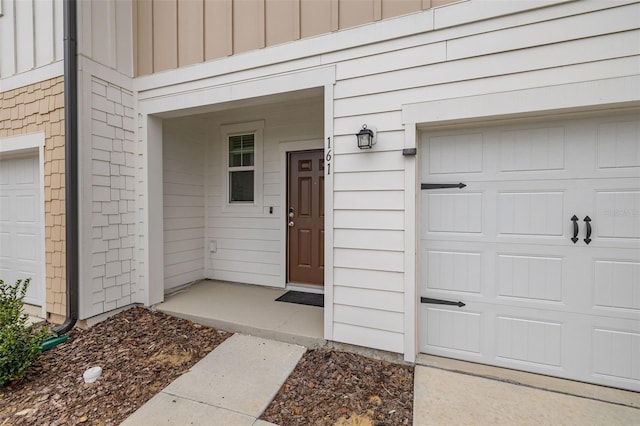 property entrance featuring a garage