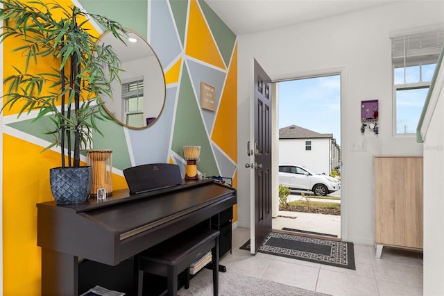 entrance foyer featuring light tile patterned flooring