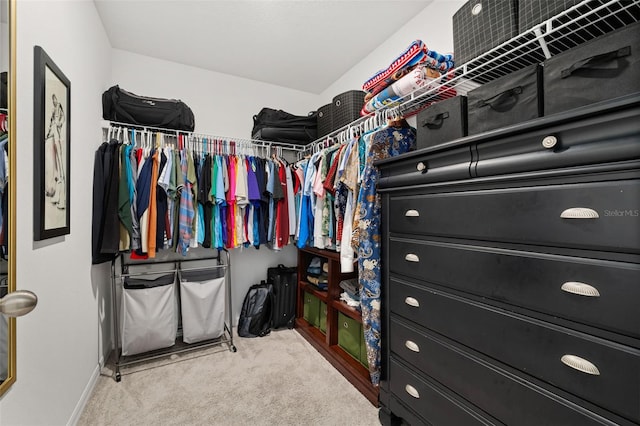 spacious closet with carpet floors