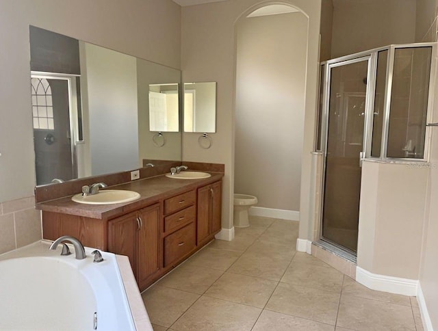 full bathroom featuring separate shower and tub, tile patterned flooring, vanity, and toilet