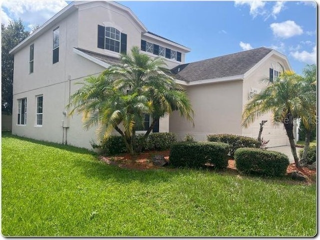 view of home's exterior featuring a yard