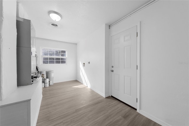 hallway featuring light hardwood / wood-style floors