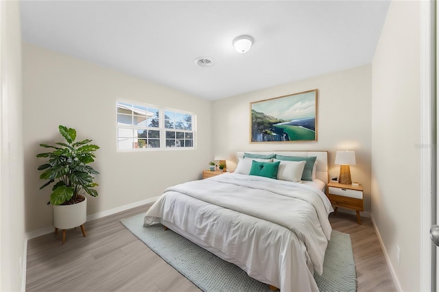 bedroom featuring light hardwood / wood-style floors