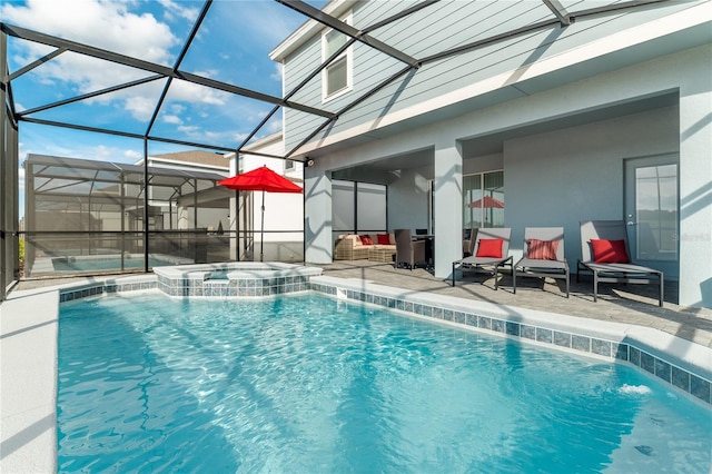 view of swimming pool with pool water feature, glass enclosure, an in ground hot tub, and a patio