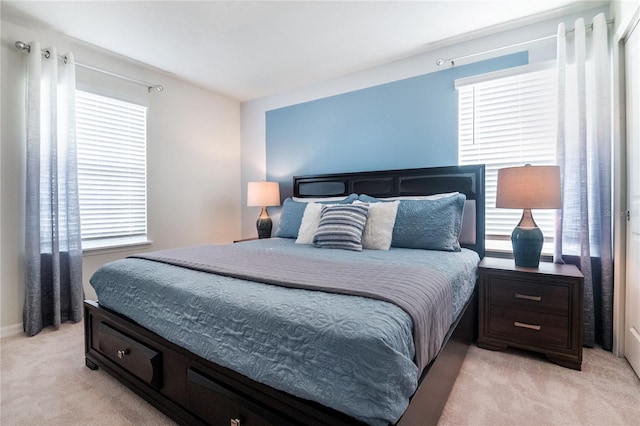 bedroom with light carpet