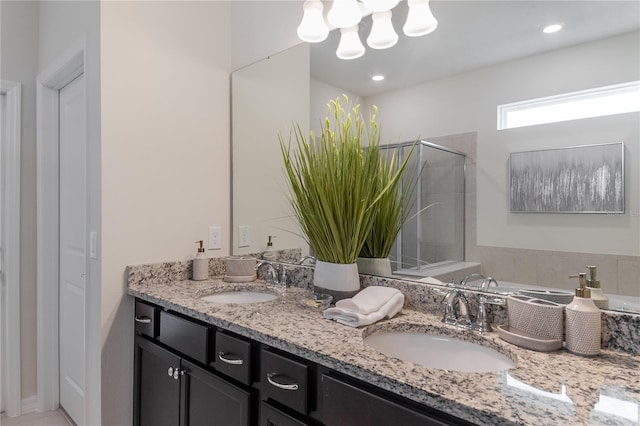 bathroom featuring vanity and walk in shower