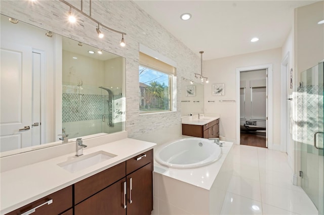 bathroom with vanity and plus walk in shower