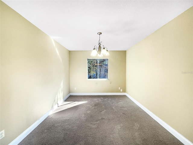 unfurnished dining area featuring carpet flooring and a chandelier