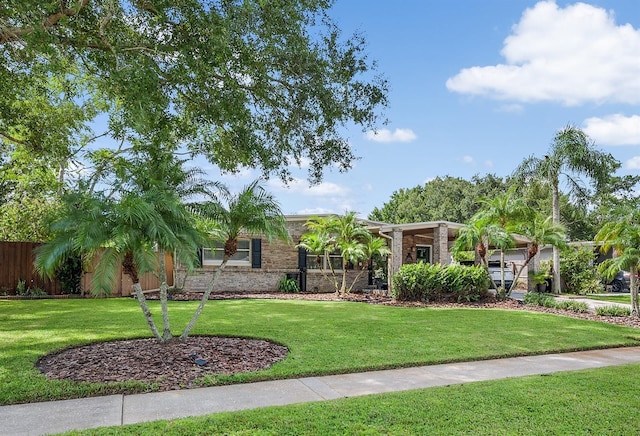 view of front of house with a front lawn