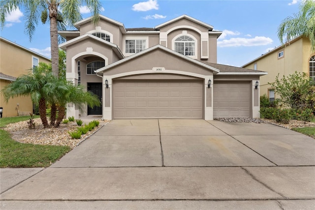 view of front of property with a garage