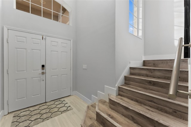 foyer with hardwood / wood-style flooring