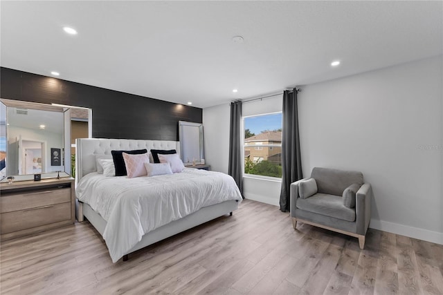 bedroom featuring light hardwood / wood-style flooring