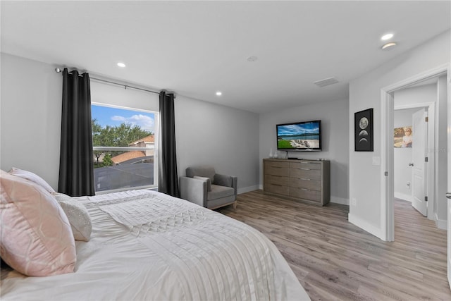 bedroom featuring light hardwood / wood-style flooring