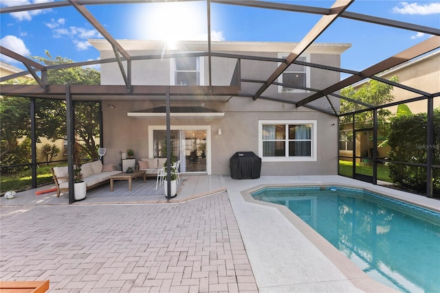 view of swimming pool with an outdoor hangout area, area for grilling, a lanai, and a patio area