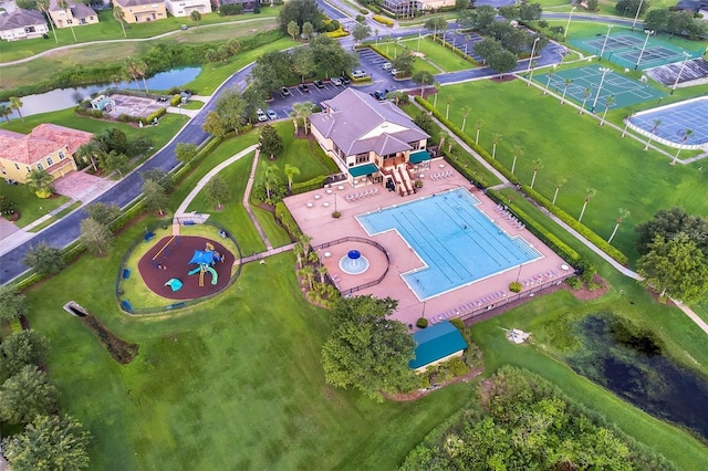 birds eye view of property featuring a water view