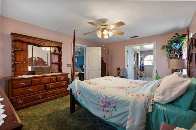 carpeted bedroom featuring ceiling fan