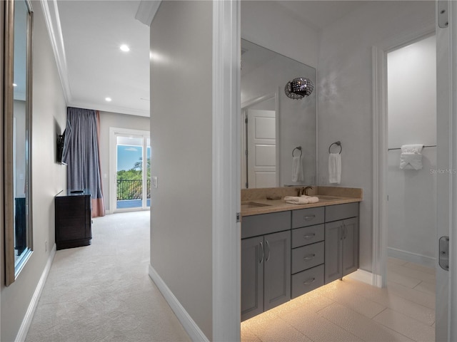 bathroom featuring vanity and ornamental molding