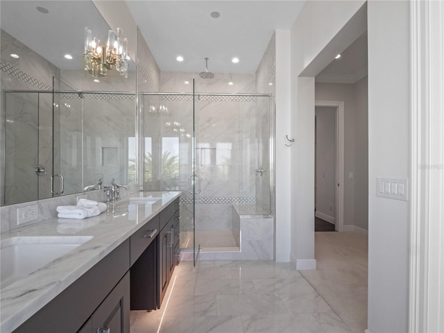 bathroom featuring vanity and an enclosed shower