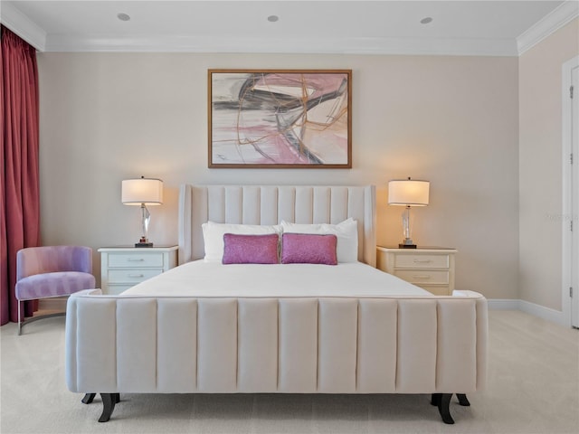 bedroom with light colored carpet and crown molding