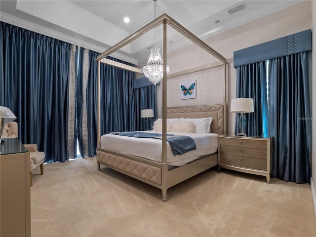 carpeted bedroom featuring a notable chandelier