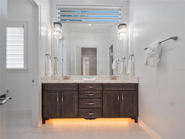 bathroom featuring tile patterned floors and vanity