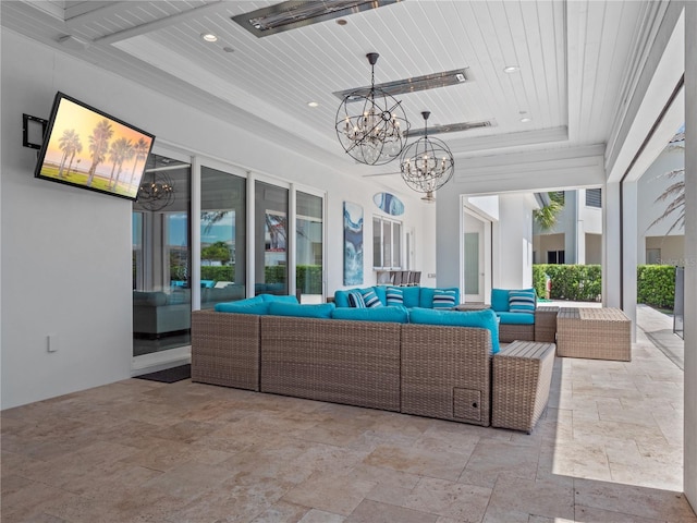 interior space with a notable chandelier, wood ceiling, and a tray ceiling