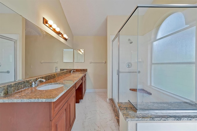 bathroom with vanity and an enclosed shower