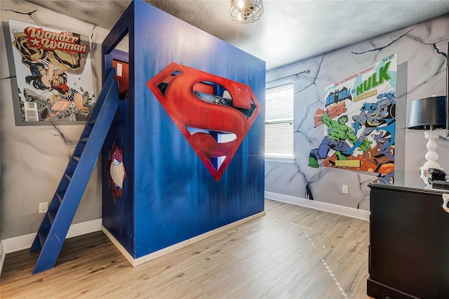 playroom featuring hardwood / wood-style flooring