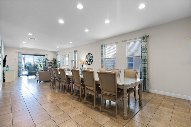 dining room featuring light tile patterned floors