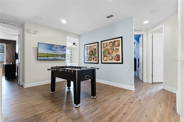 game room featuring hardwood / wood-style floors