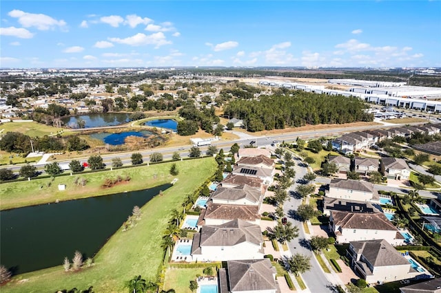 drone / aerial view with a water view