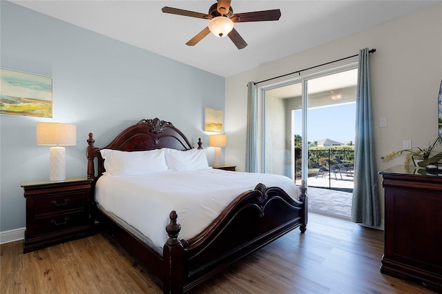 bedroom featuring hardwood / wood-style floors, ceiling fan, and access to exterior