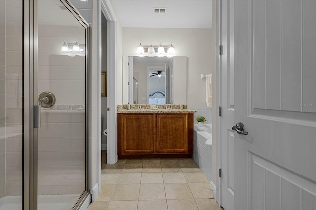 bathroom featuring ceiling fan, tile patterned flooring, vanity, and independent shower and bath