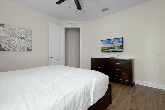 bedroom featuring ceiling fan and wood-type flooring