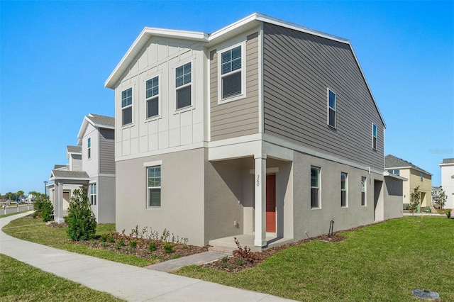 view of side of home featuring a yard