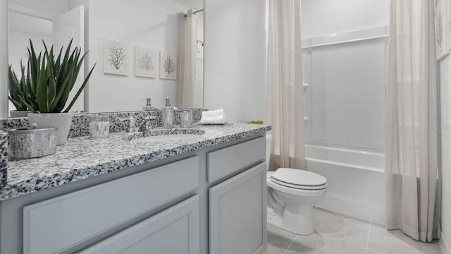 full bathroom with tile patterned floors, vanity, shower / bathtub combination with curtain, and toilet