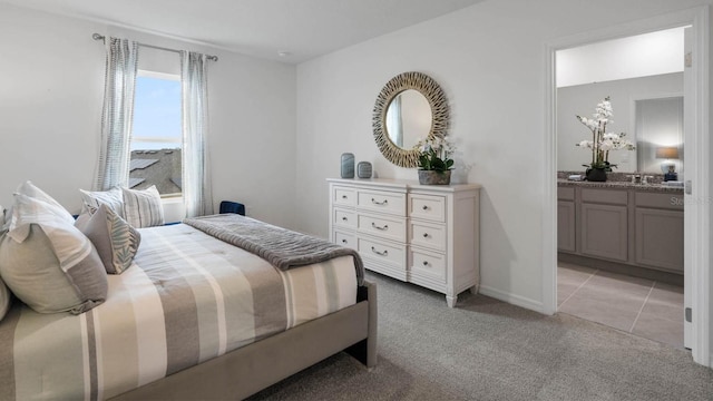 bedroom featuring light carpet