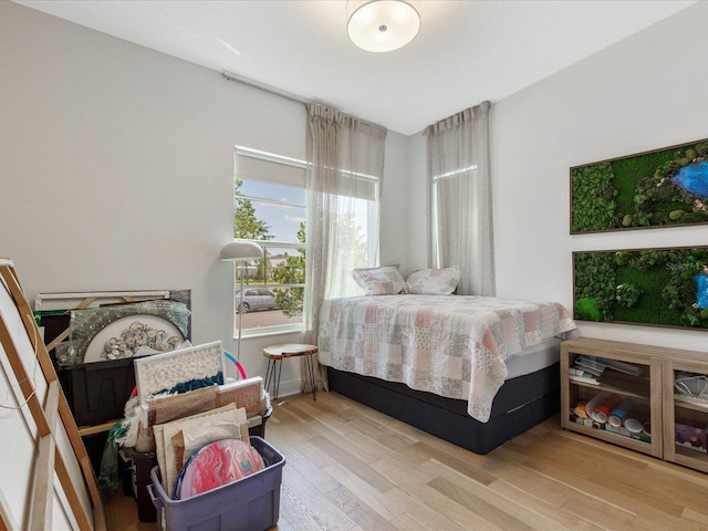 bedroom featuring hardwood / wood-style floors