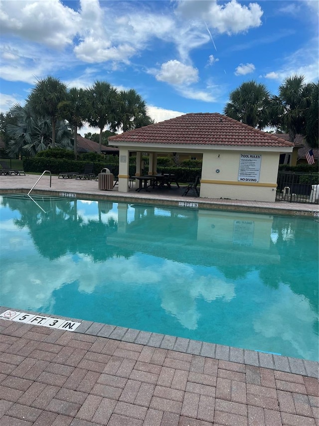 view of pool with a patio area