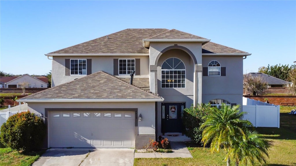 view of property featuring a garage