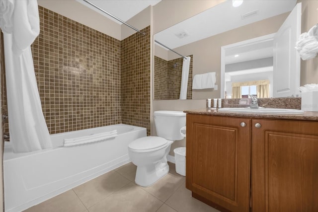 full bathroom with shower / bath combination with curtain, vanity, toilet, and tile patterned flooring