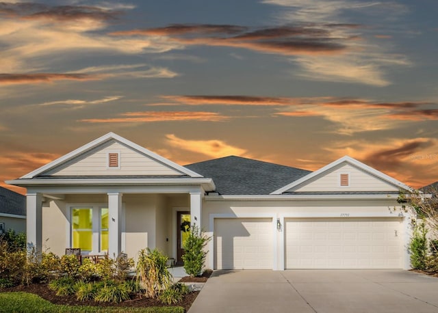 view of front of property with a garage