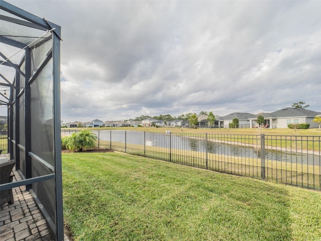 view of yard with a water view