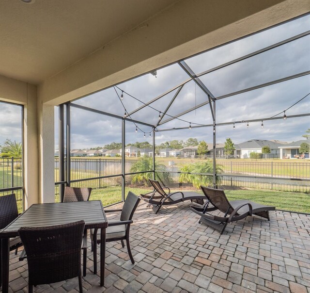 view of patio with a lanai