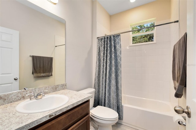 full bathroom with toilet, shower / bath combo with shower curtain, and vanity