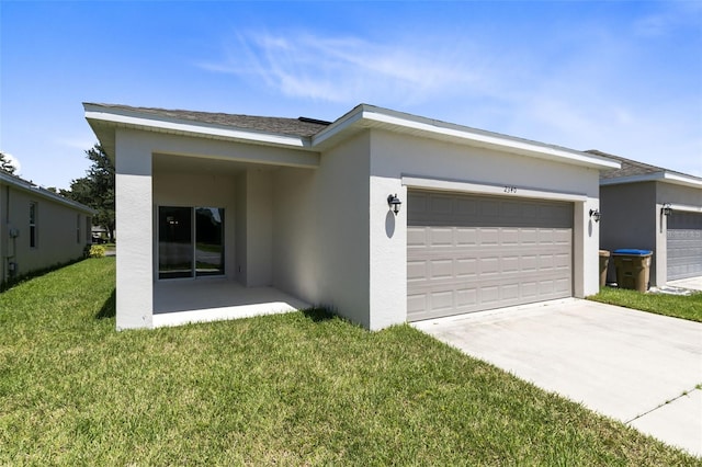 view of front facade with a garage and a front yard