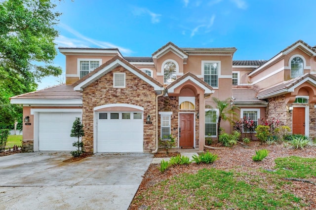 view of front of property with a garage