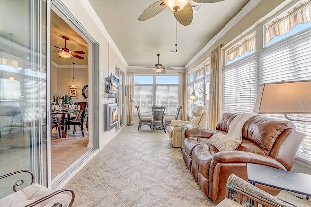 sunroom / solarium with ceiling fan